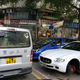 Image for article titled The Most Dedicated Mechanics In The World Wrench On The Streets Of Hong Kong